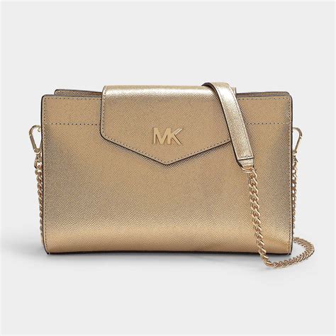 gold handbag michael kors|michael kors gold clutch bag.